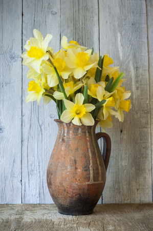 still life with a bouquet of narcissusの写真素材