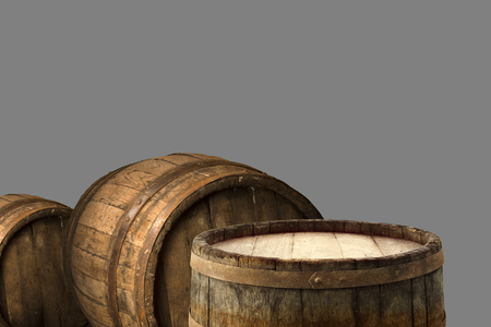 Red wine with barrel on vineyard in green Tuscany, Italy.
