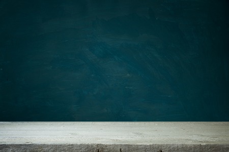 background of barrel and worn old table of woodの写真素材