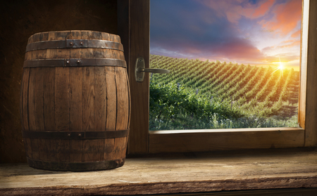 White wine with barrel on vineyard in Chianti, Tuscany, Italyの写真素材