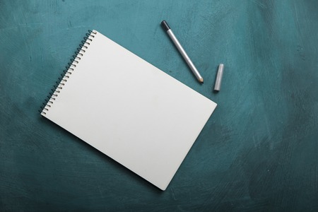 blank notebook on desk background.の写真素材
