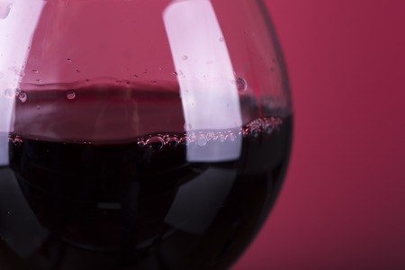 Red wine. Glass of wine. Pouring red wine.の写真素材