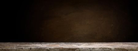 background of barrel and worn old table of woodの写真素材