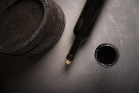 Row of vintage wine bottles in a wine cellarの写真素材