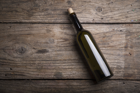 Row of vintage wine bottles in a wine cellarの写真素材