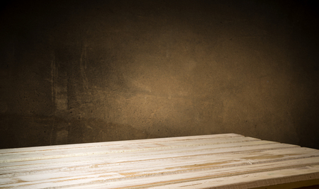 background of barrel and worn old table of woodの写真素材