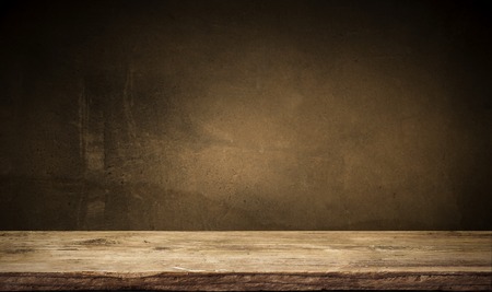 background of barrel and worn old table of woodの写真素材