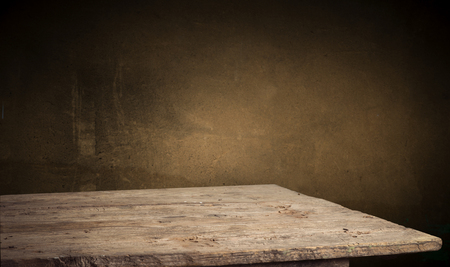 background of barrel and worn old table of woodの写真素材