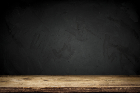 background of barrel and worn old table of woodの写真素材