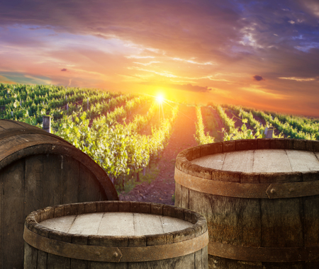 background of barrel and worn old table woodの写真素材