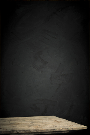 background of barrel and worn old table of wood.の写真素材