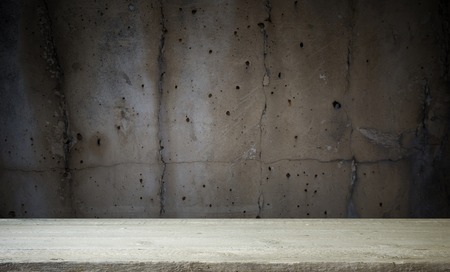 Stone table top and blurred shopping plaza background - can used for display or montage your productsの写真素材
