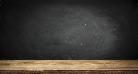 Old wood table top with smoke in the dark backgroundの写真素材