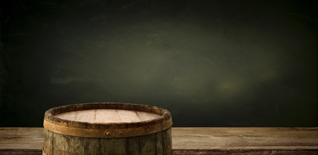 Old wood table top with smoke in the dark background.の写真素材