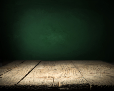 background of barrel and worn old table of woodの写真素材