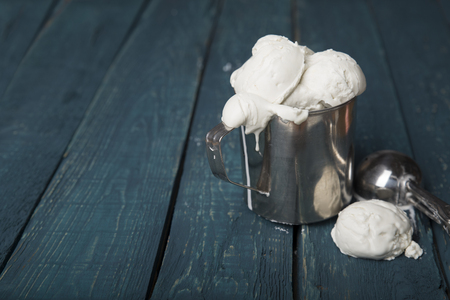 strawberry ice cream ball on pink background, top viewの写真素材