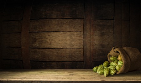 Still life with a keg of beer and hopsの写真素材