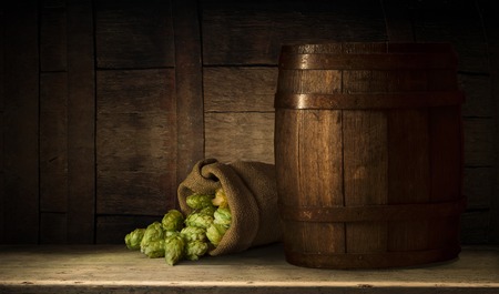 Still life with a keg of beer and hopsの写真素材