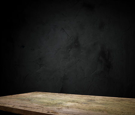 Old wood table with smoke in the dark background.の写真素材