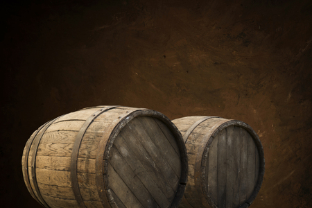 background of barrel and worn old table of woodの写真素材