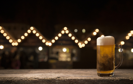 Desk space platform over bokeh light at night pub for product display montage.の写真素材