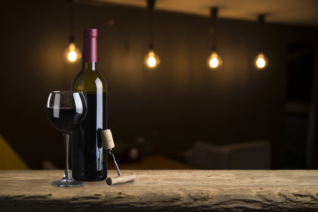 Wine cellar with wine bottle and glasses.with space for textの写真素材