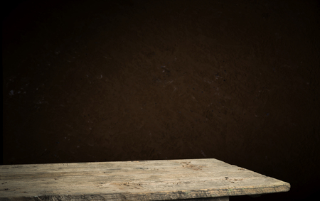 background of barrel and worn old table of woodの写真素材