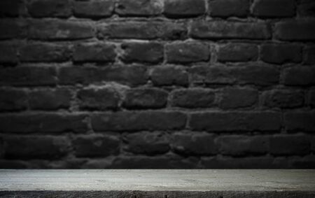 image of wooden table in front of abstract blurred background of resturant lightsの写真素材