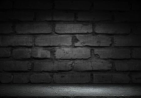Selected focus empty brown wooden table and wall texture or old black brick wall blur background image. for your photomontage or product displayの写真素材