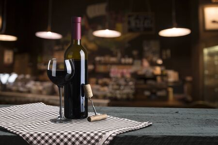 Wine cellar with wine bottle and glasses.with space for text