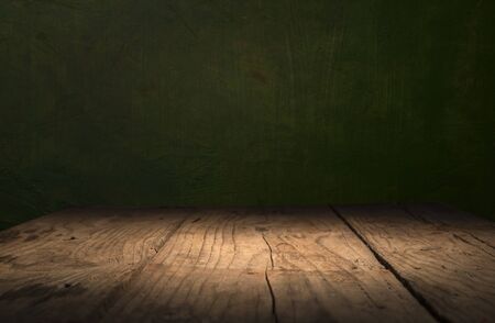 Empty wood table top on blur light gold bokeh of cafe restaurant in dark background