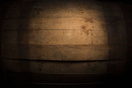 background of barrel and worn old table of wood.