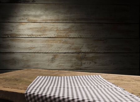 Dark wooden table for product, brown wooden perspective interior with old cutting boardの写真素材