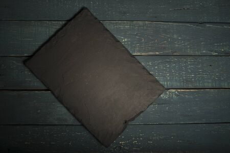 Empty top of natural stone shelves and stone wall background. For product display