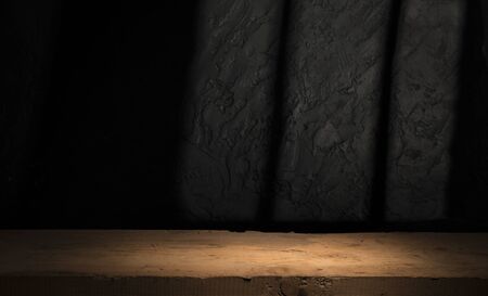 Wooden barrel on a table and textured backgroundの写真素材