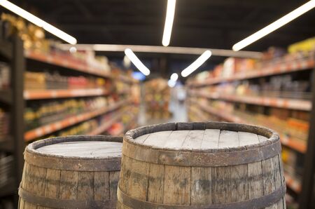 Beer style- bottle, beer in the glass and covers on wooden table. Free space for text. Top viewの写真素材
