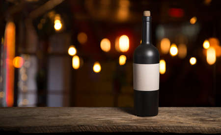 the still life with red wine, bottle, glass and old barrel