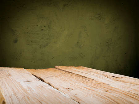 background of barrel and worn old table of woodの写真素材