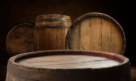 Empty wooden table top with lights bokeh on blur restaurant background.の写真素材