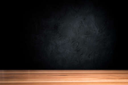 Old wood table with smoke in the dark background.の写真素材