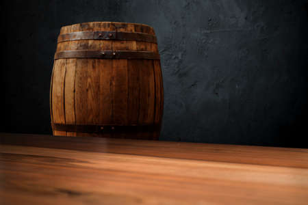 Red wine with barrel on vineyard in green Tuscany, Italyの写真素材