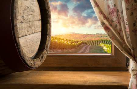 Red wine Red wine with barrel on vineyard in green Tuscany, Italywith barrel on vineyard in green Tuscany, Italy. High quality photoの写真素材