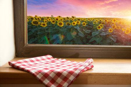 Sunflower on the wooden table. Sunflower fieldの写真素材