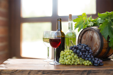 red wine bottle and wine glass onの写真素材