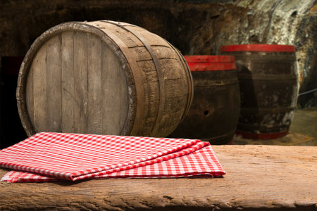 Empty table decorated with red checkered towel