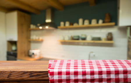 Cloth napkin on wood table with glassの写真素材