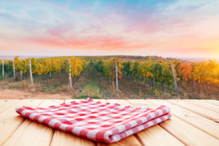 blurred background of vineyard and brown tableの写真素材