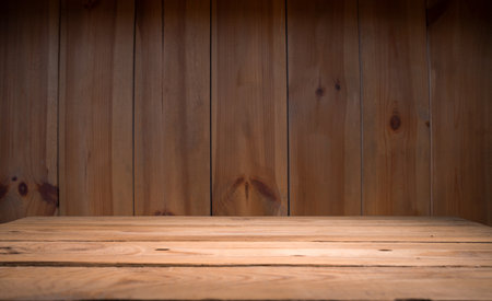Wooden table in front of blurred oakの写真素材