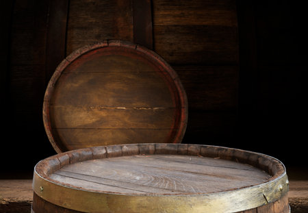 background of barrel and worn old tableの写真素材