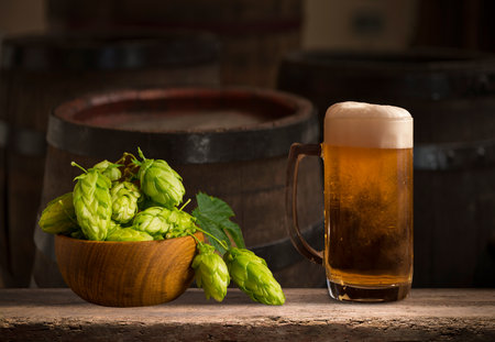 Beer barrel with beer glasses on tableの写真素材